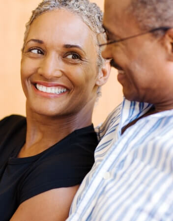 Couple smiling at each other