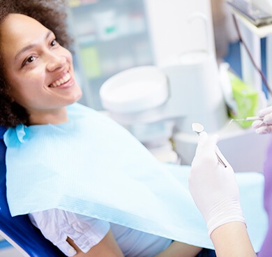 woman receiving a dental exam